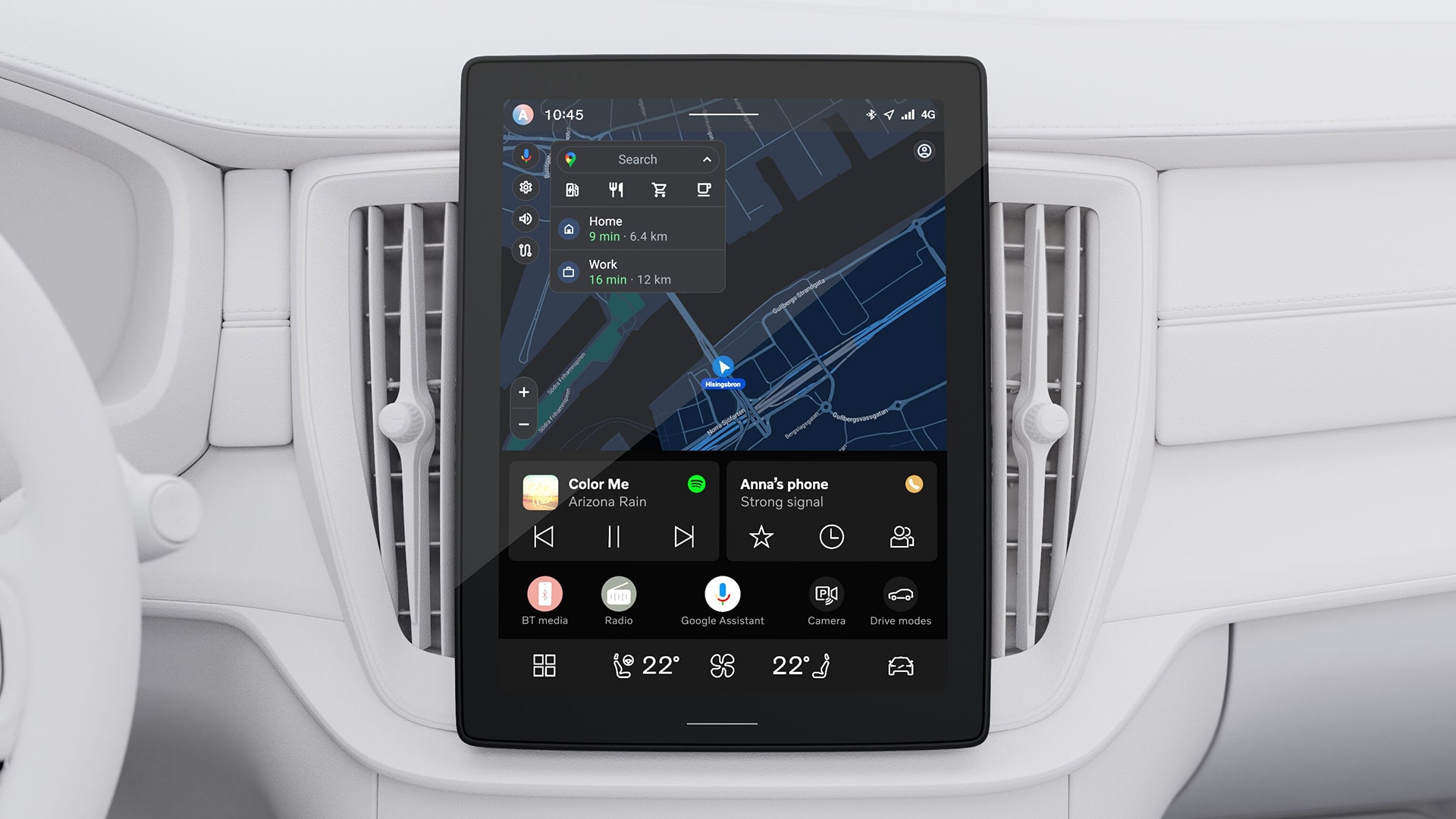 Close-up of a Volvo car’s central touchscreen displaying navigation, media, phone connectivity, and climate controls.