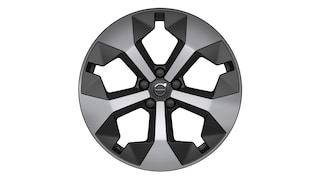 Volvo alloy wheel with a modern, geometric five-spoke design in silver and black.