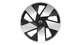 Volvo alloy wheel with a modern, geometric black and silver design featuring the Volvo logo at the center.
