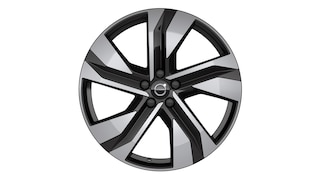 Volvo alloy wheel with a five-spoke, two-tone design featuring the Volvo logo at the center.