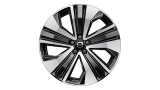 Llanta de aleación Volvo con un moderno diseño geométrico de radios en acabado negro y plateado.