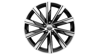 Cerchio in lega Volvo con design a più razze nero e argento con logo Volvo al centro.