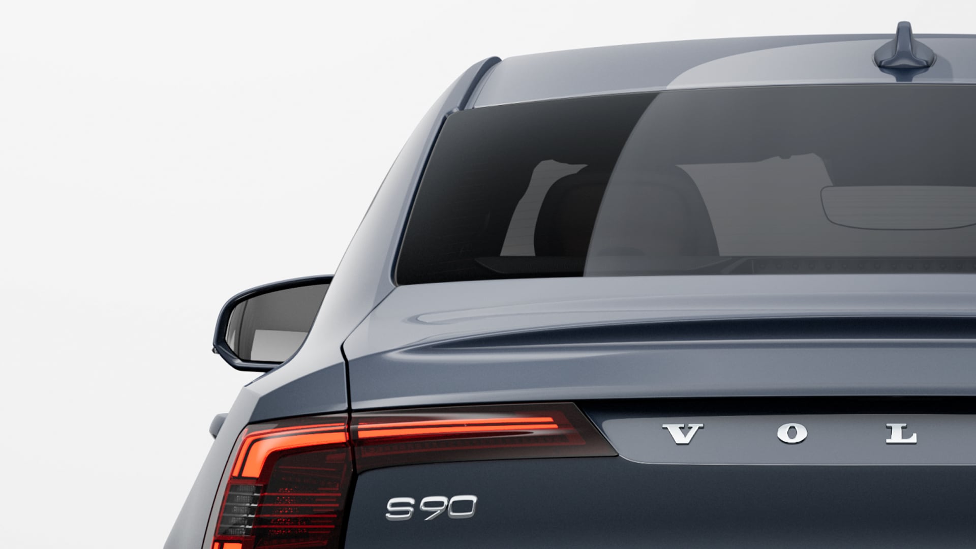 Rear view of a Volvo S90, highlighting the model badge and distinctive taillight design.