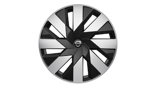 عجلة فولفو من المزيج المعدني بتصميم هندسي عصري باللونين الأسود والفضي.