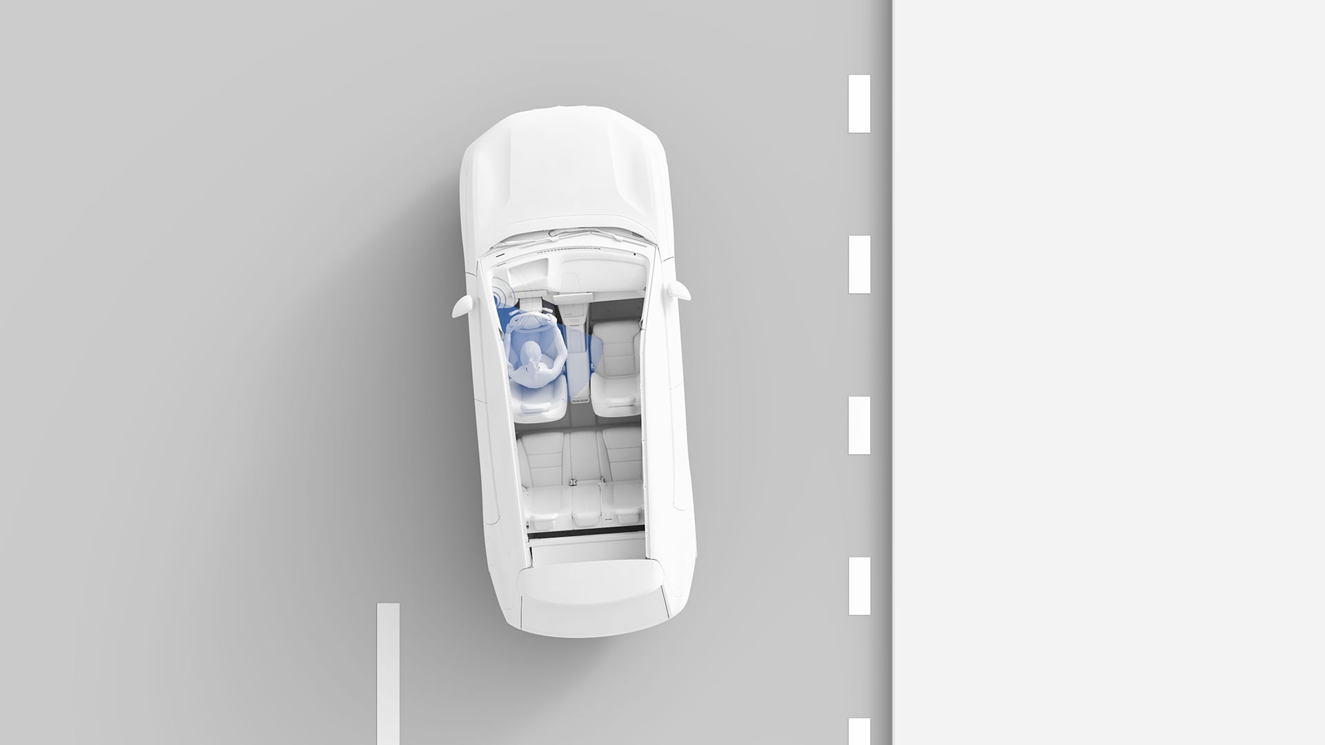 沃尔沃汽车俯视图，显示驾驶员坐在前排座椅上，蓝色区域突出显示安全功能。